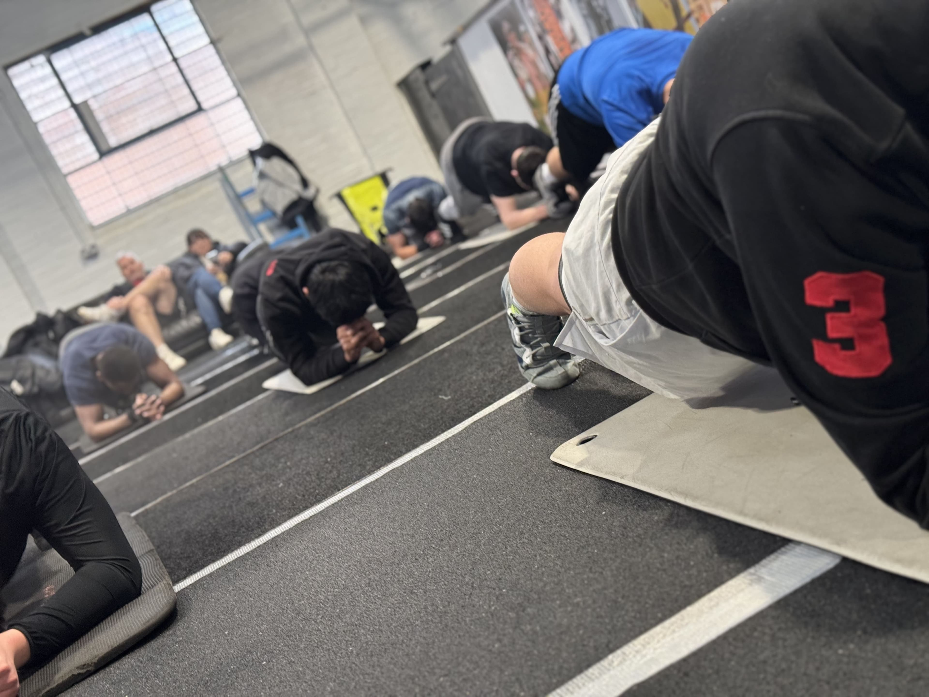 Class doing plank exercise